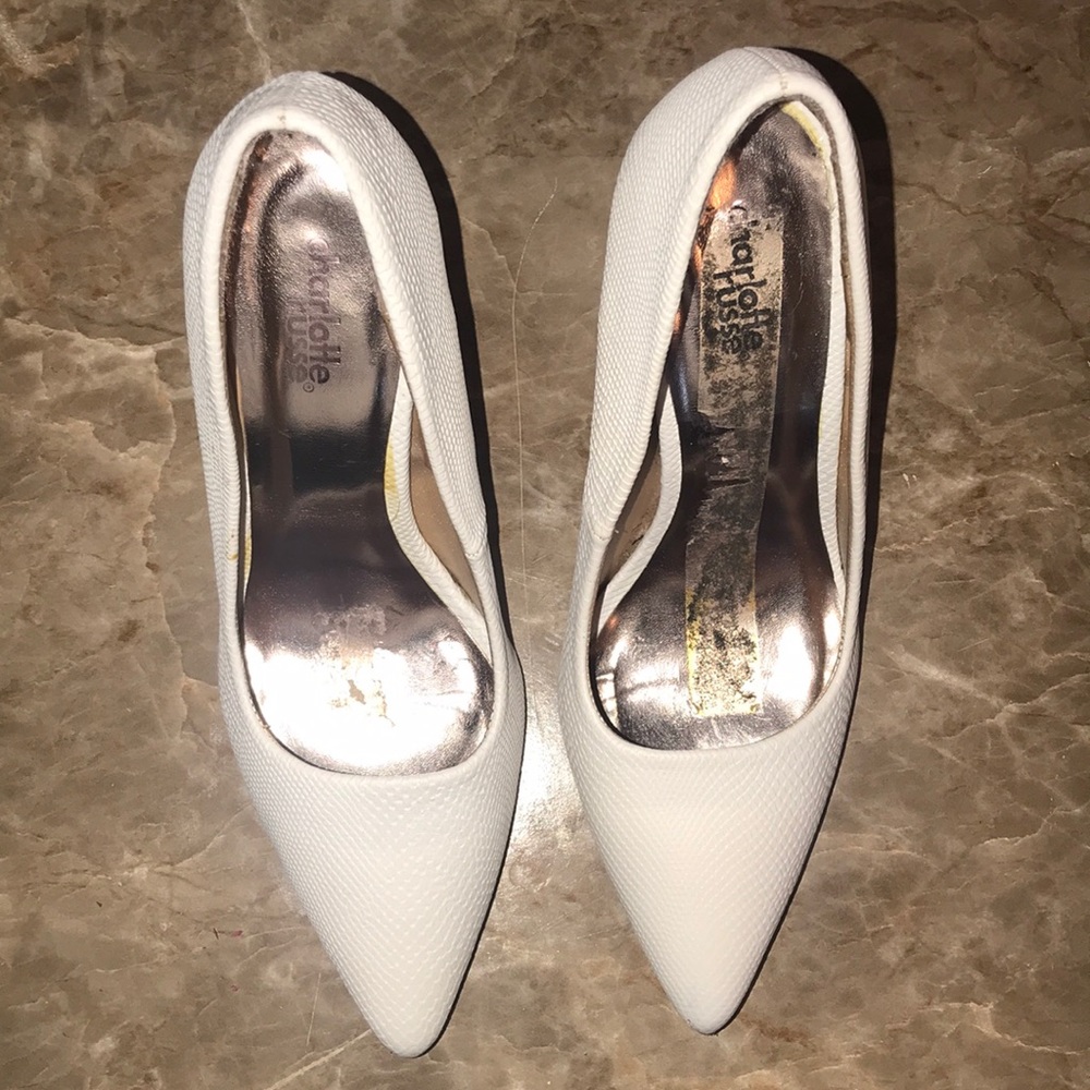 White snakeskin pumps